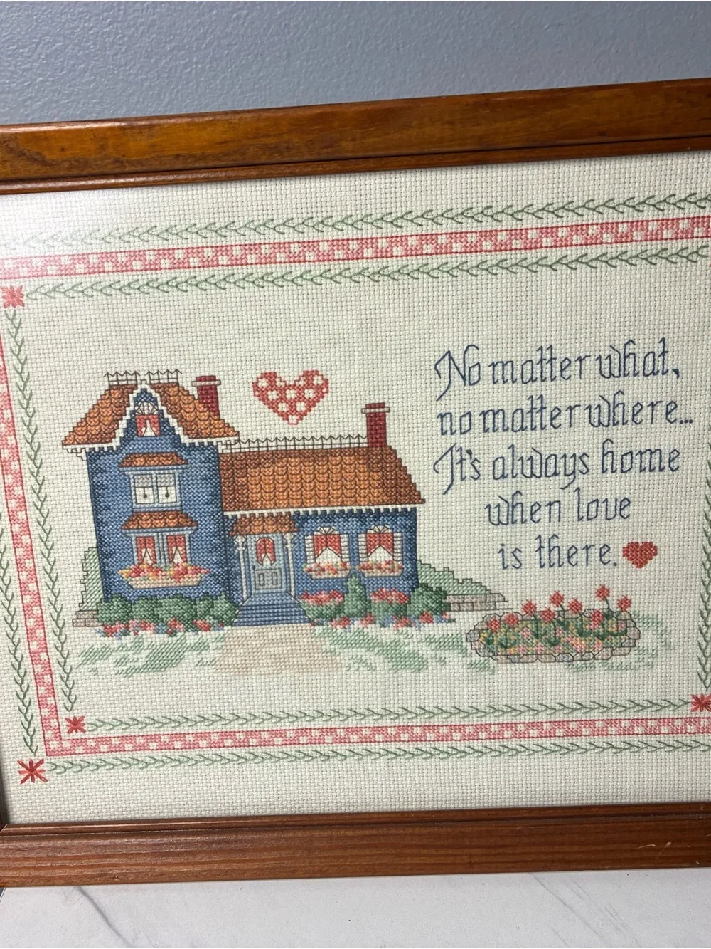 Framed Cross Stitch Home Sampler with Blue House and Quote